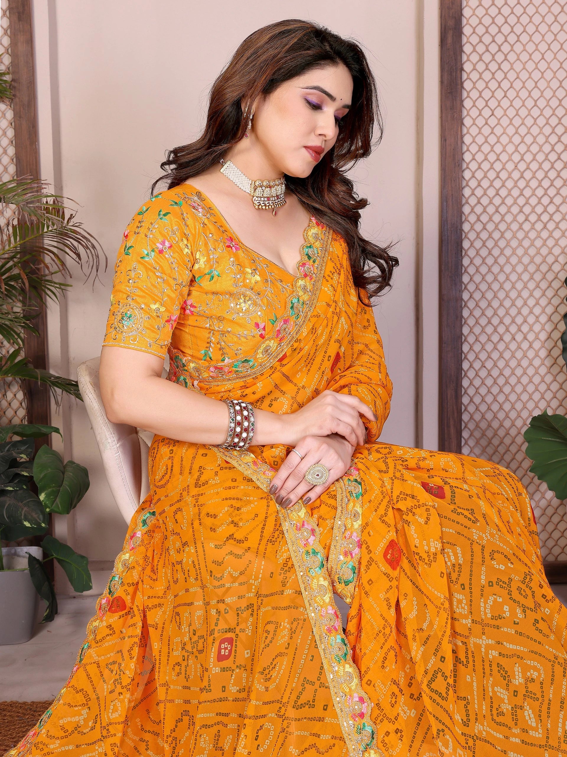 yellow bandhej print georgette saree